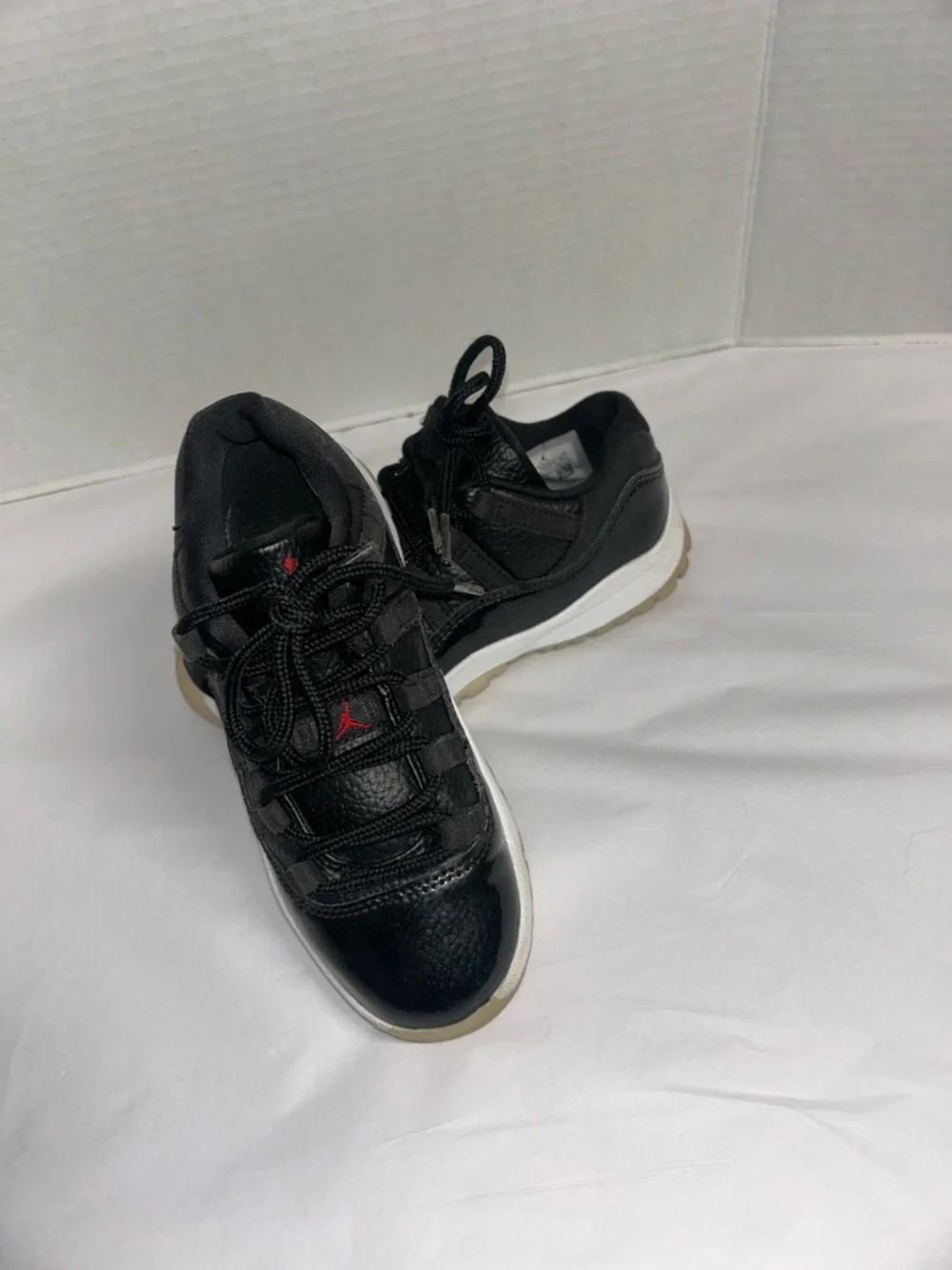 Jordan Kids Black Low-Top Sneakers with Red Logo Accents